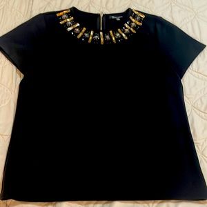 Going out top- size S. Black w embellishments.